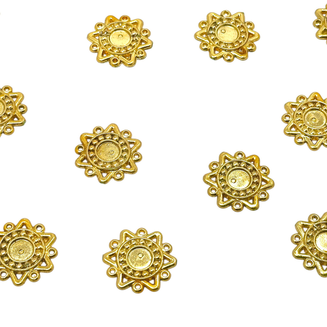 Intricate gold floral flatback shapes for Mandala art