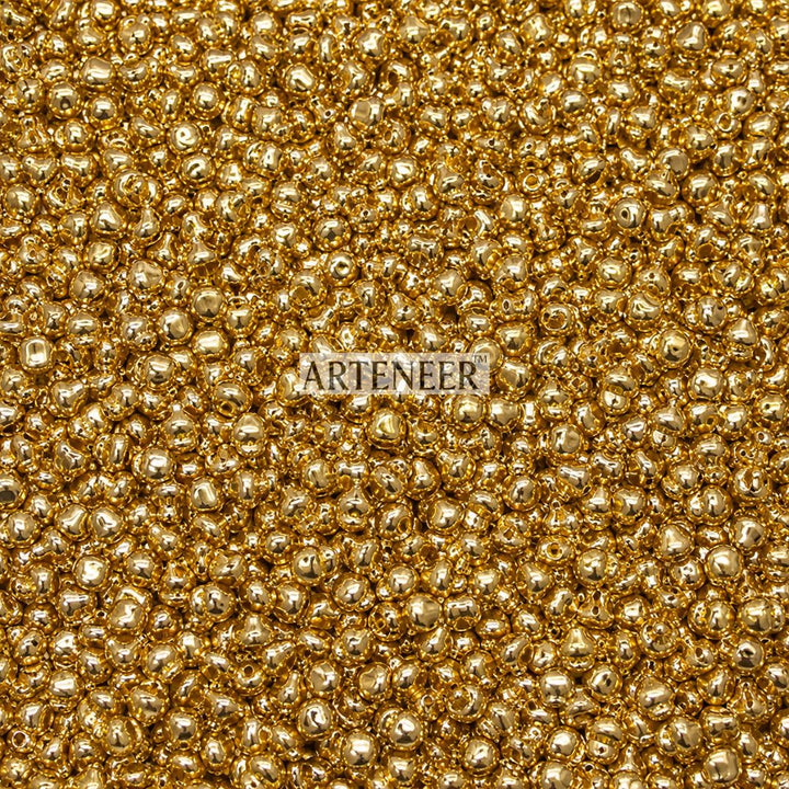 Gold plated ghungru bells with loop for payal anklets, kathak dance ghungroo, and traditional Indian craft in India