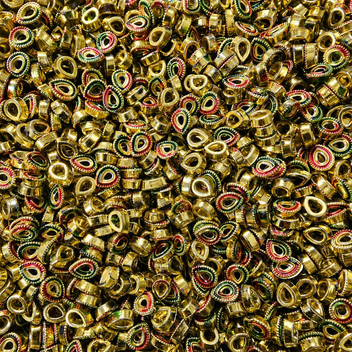 Bulk gold Meenakari Pan leaf shaped embellishments with red and green enamel for traditional DIY crafts