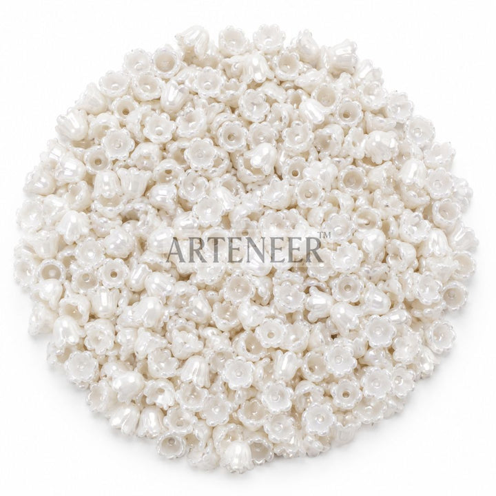 White small hanging flowers for DIY crafts, mega pack of 1100 mini white flower charms by Arteneer
