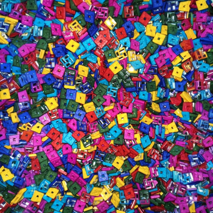 Vibrant multicolor Swastik acrylic beads for traditional Indian DIY crafts