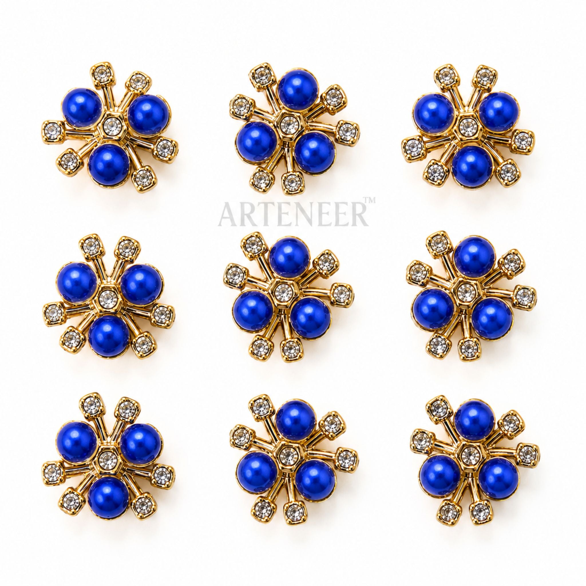 Set of blue flower-shaped earrings with gold and crystal accents on a white background, branded 'Arteneer'.
