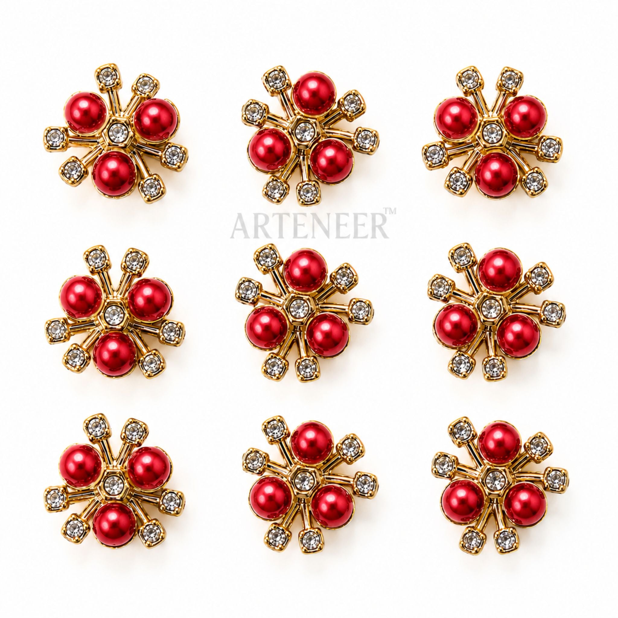 Red and gold snowflake-shaped earrings on a white background with 'Arteneer' branding.
