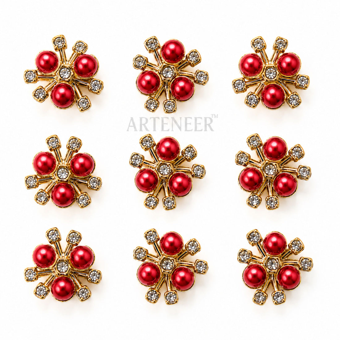Red and gold snowflake-shaped earrings on a white background with 'Arteneer' branding.