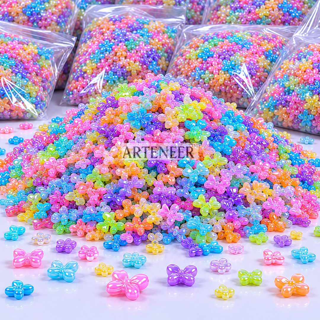 Colorful butterfly-shaped beads with 'ARTENEER' branding on a white background