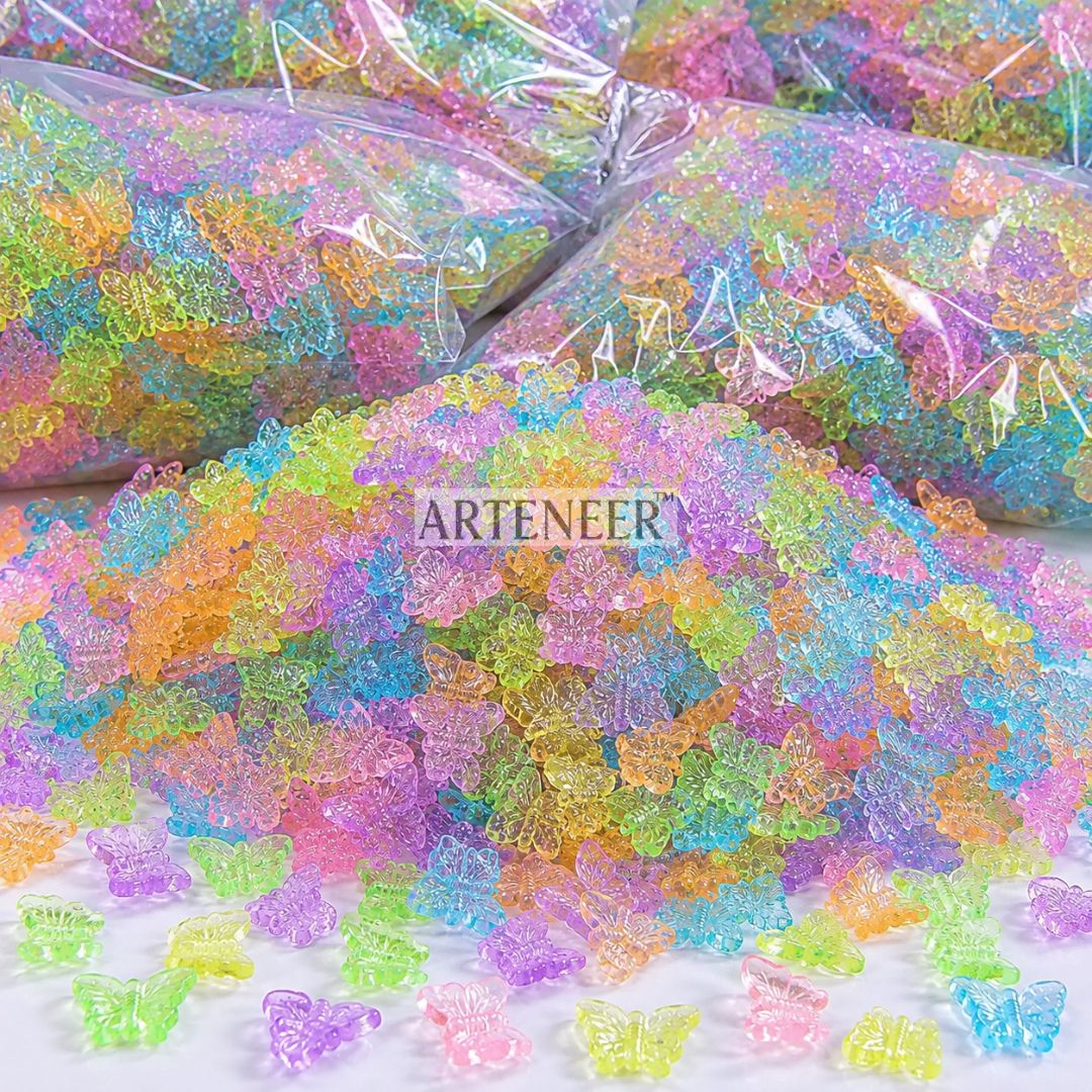 Colorful butterfly-shaped gummy candies with 'ARTENEER' branding.