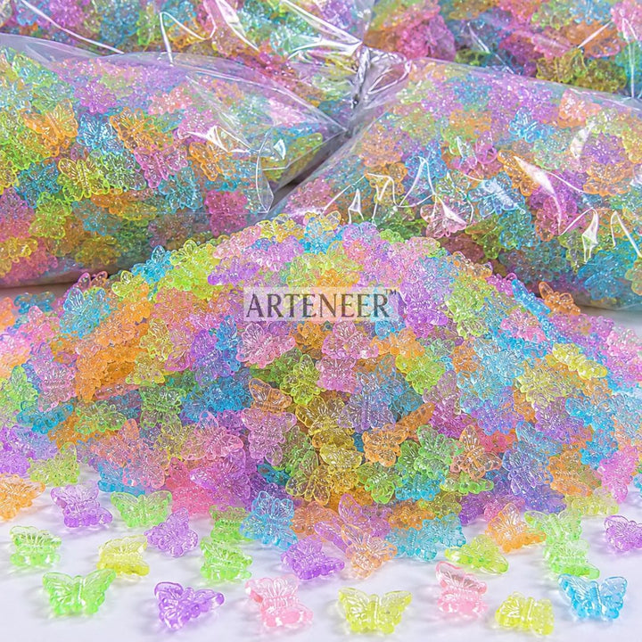 Colorful butterfly-shaped gummy candies with 'ARTENEER' branding.